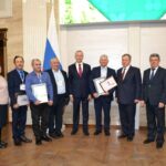 Андрей Травников и Андрей Шимкив наградили аграриев – победителей трудового соревнования